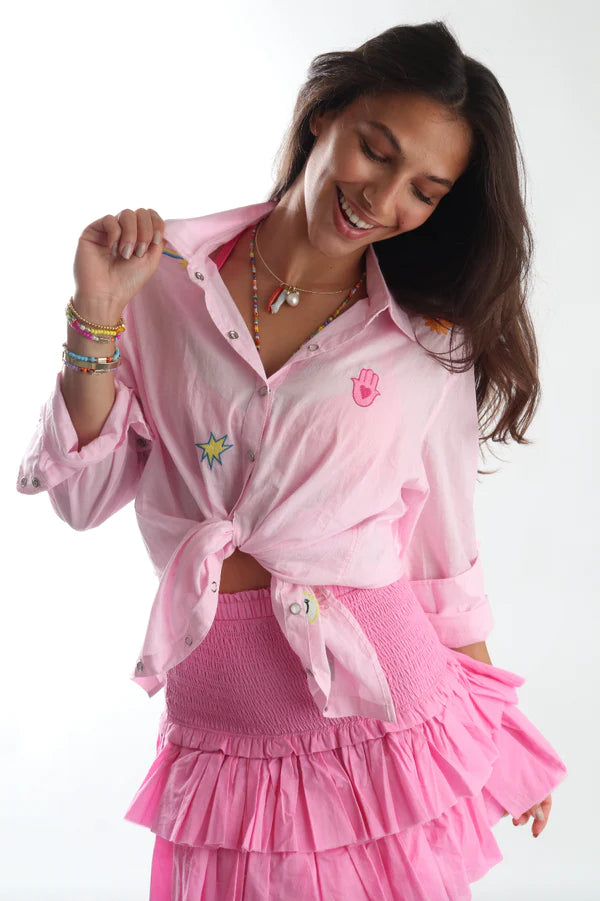 pink embroidered shirt